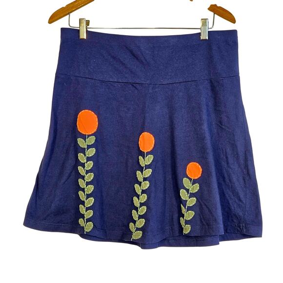 Size Large – Synergy Navy Organic Cotton Mini Skirt with Embroidered Flowers - Picture 1 of 5